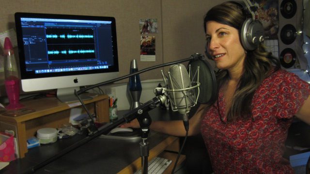 Photo of Rachel Alena at her desk